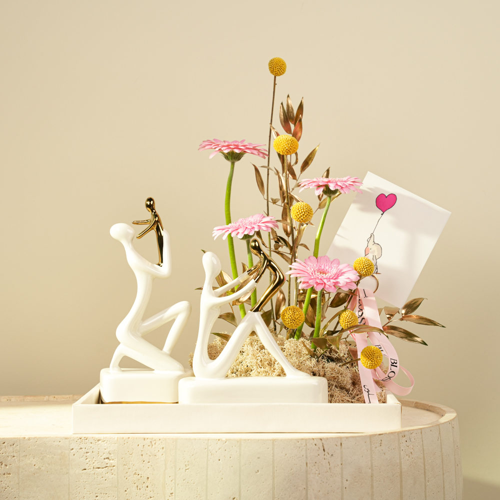 Pure Devotion Figurine & Floral Arrangement